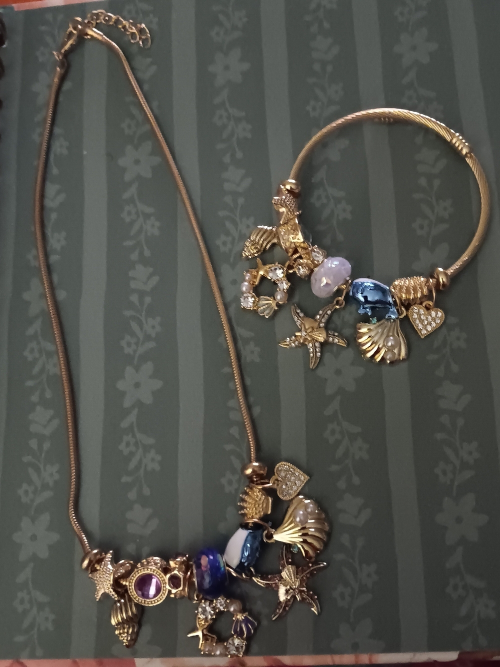 Gold-Tone Charm Necklace and Bracelet Set with Blue and Purple Accents